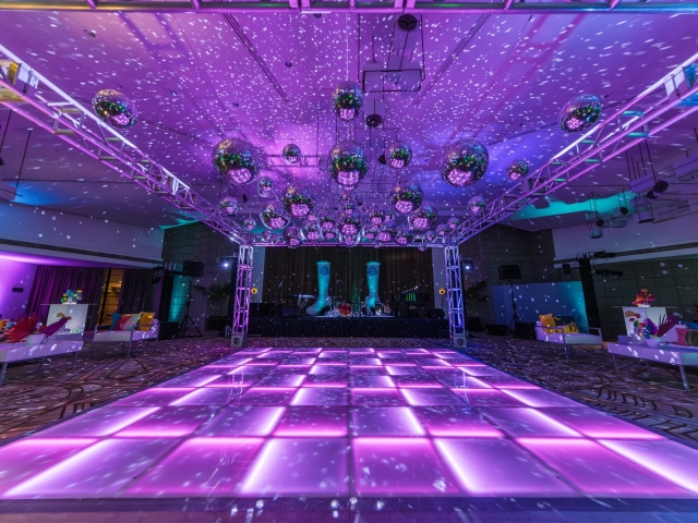 Dance floor with purple lighting.