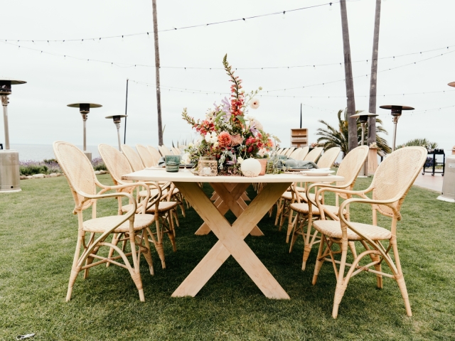 Front view of a table overlooking the ocean for a President's club dinner.