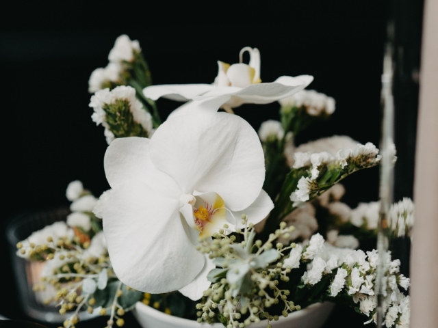 White floral table decor at wedding