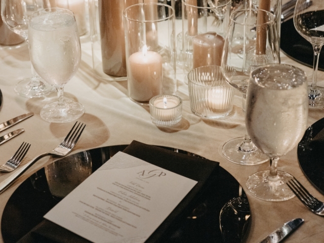 Wedding place setting with elegant white candles