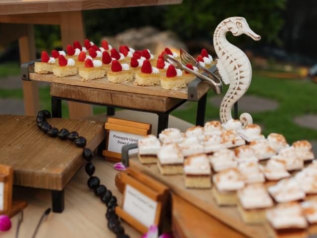 A dessert display at an outdoor event.